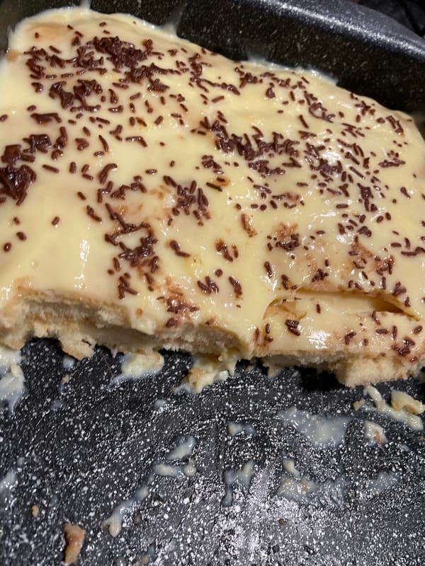 Partially eaten layered dessert photographed in Zlatograd, Bulgaria