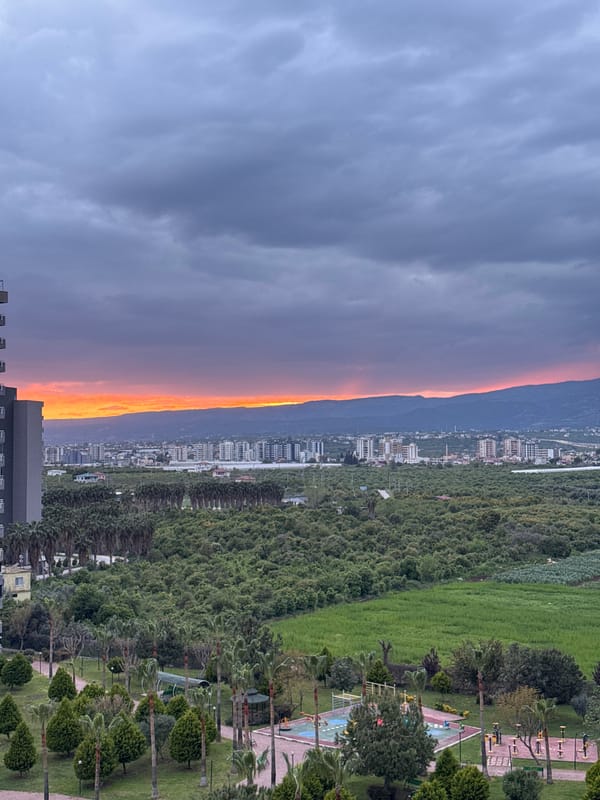 Vivid sunset captured over Erdemli coastline from elevated view