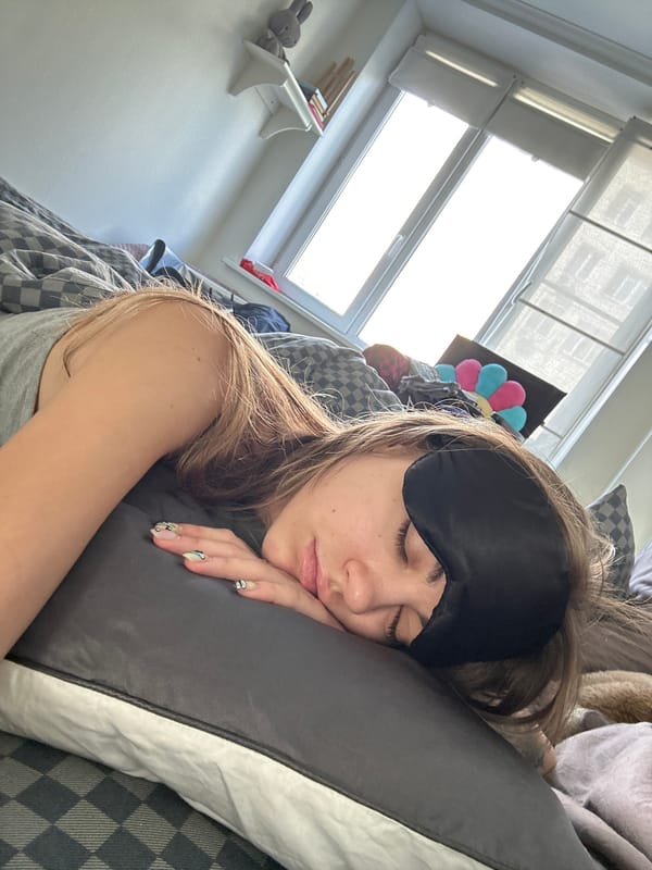 Woman awakens in Moscow bedroom during morning hours