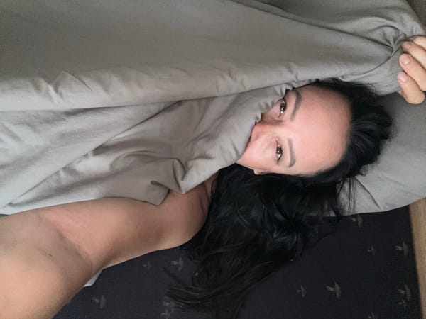 Woman in bed observed in Chaikovsky, Russia early morning