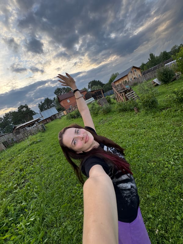 Laid-back afternoon in a rural yard with selfies and a dog