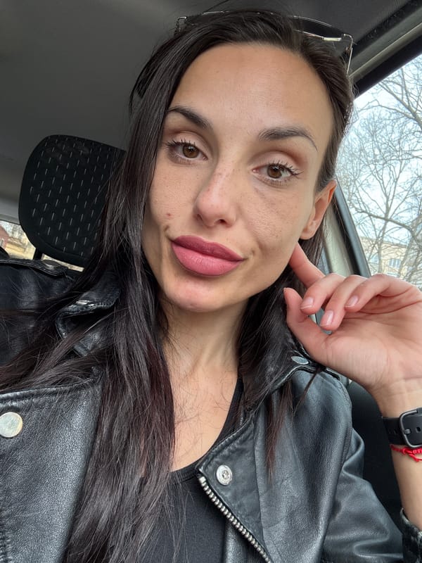 Woman takes selfie in black leather jacket in Pleven