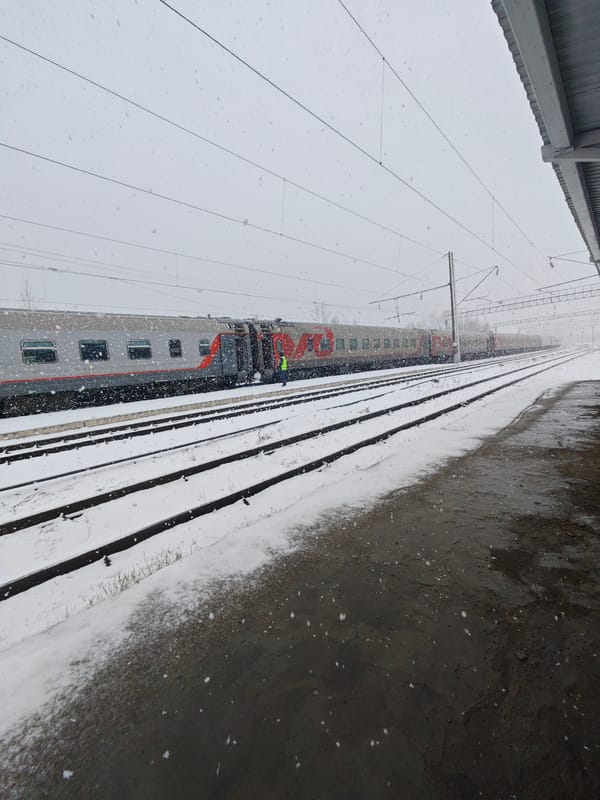 Snowy morning commute captured at Kambarka railway station