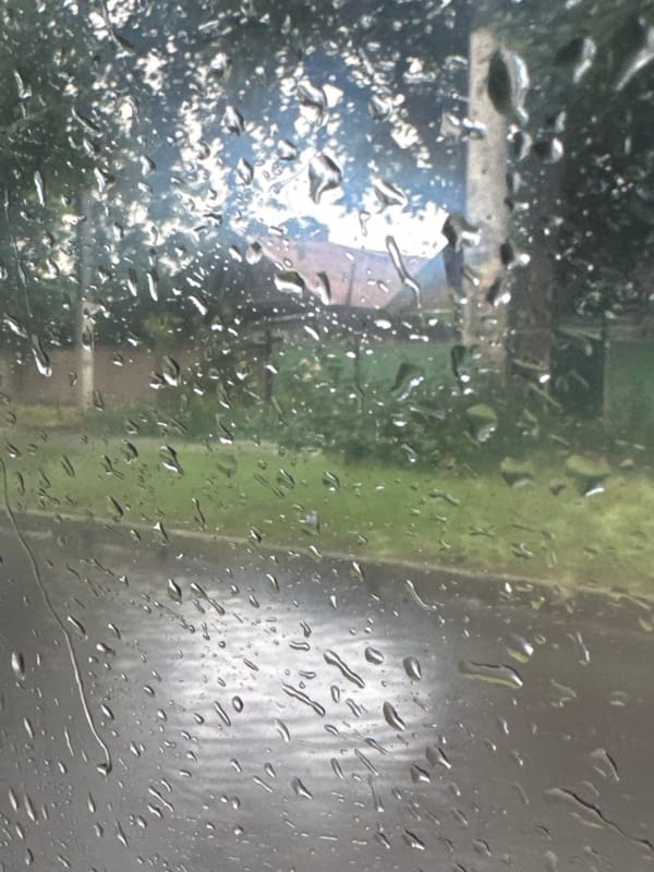 Rainy day in Tiraspol, seen through a wet car window