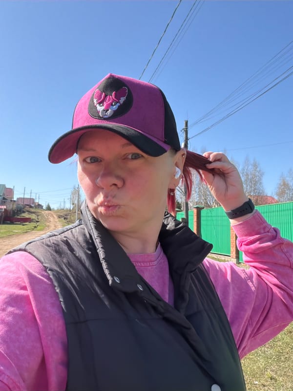 Person in pink outfit photographed in Chaikovsky forest area