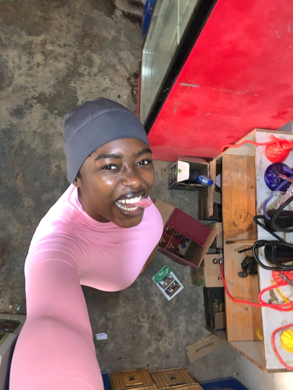 Woman captures playful selfies at Nigerian stadium