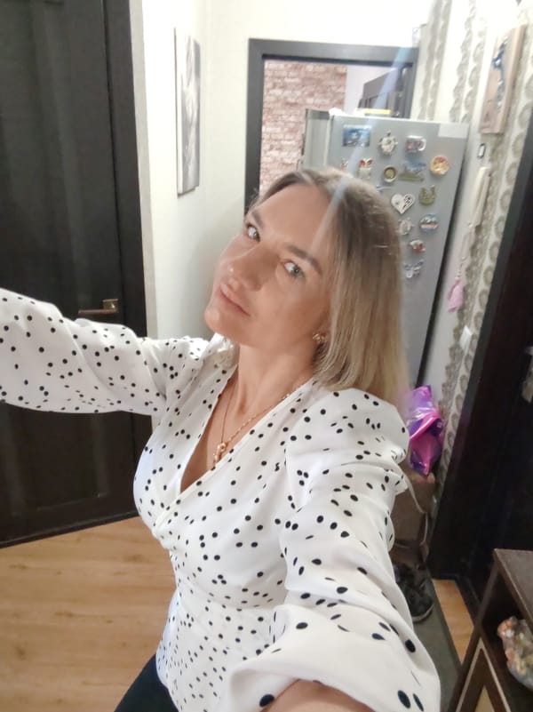 Woman takes mirror selfies at home in Petropavlovsk-Kamchatsky