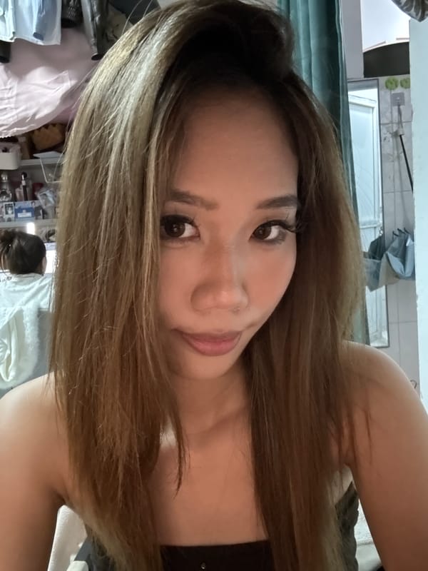 Woman takes selfies indoors in Nan'an District, China