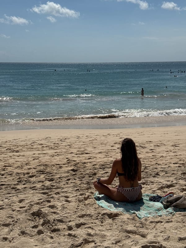 Morning beach life unfolds in Kuta Selatan, Indonesia