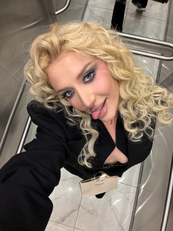 Woman takes selfie at Belgrade shopping location