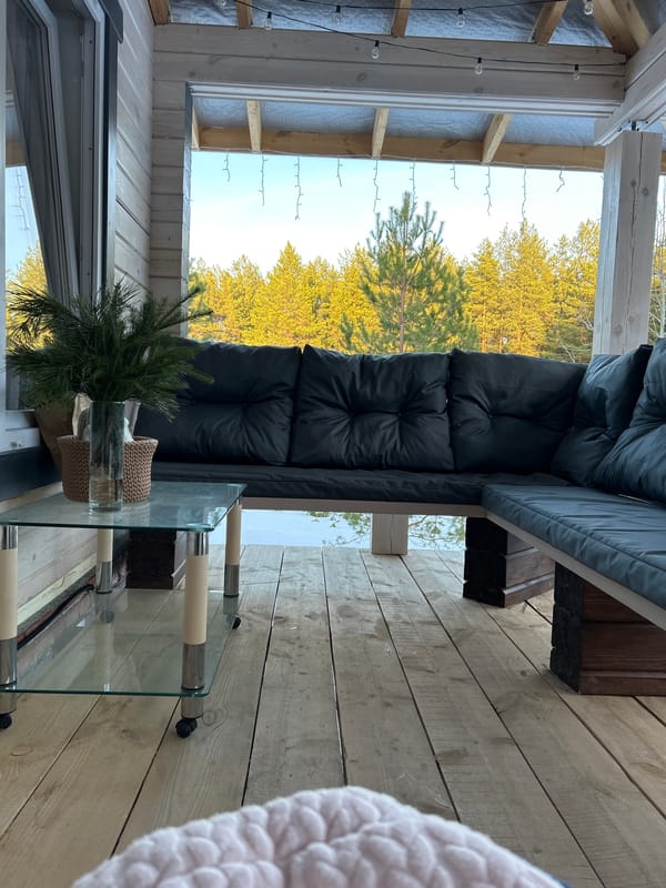 Family relaxation time at covered porch in snowy Russia