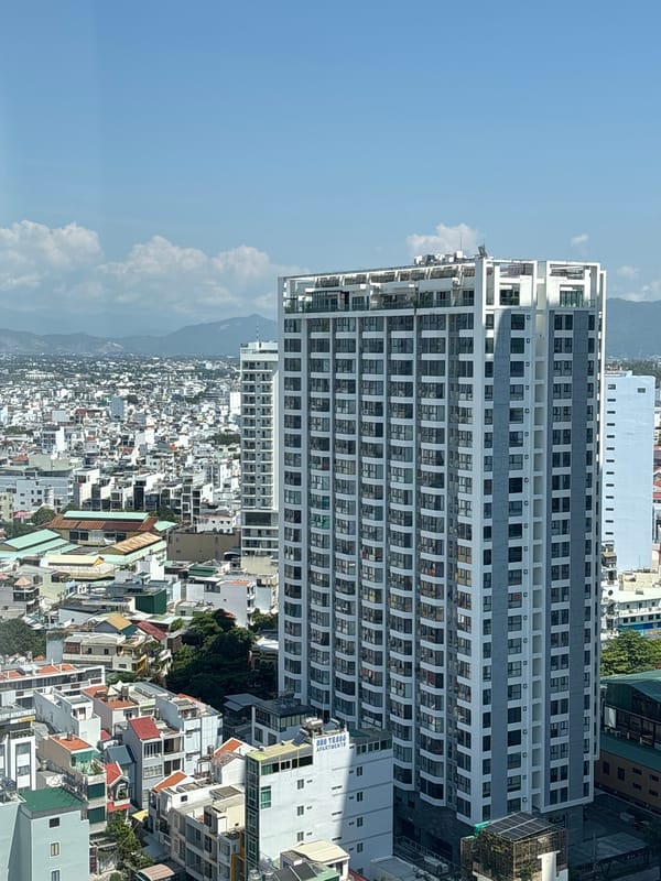Nha Trang Ward at night: skyline, coast, and street level