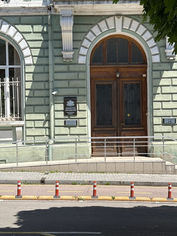 Tourist browses souvenir shop displays in Varna, Bulgaria