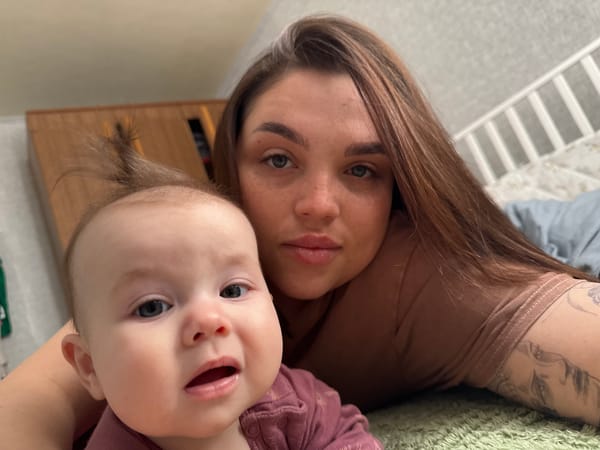Mother and baby photographed together at home in Bataysk