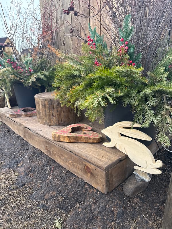 Wooden bear carvings and decorative display spotted in Tyulyuk
