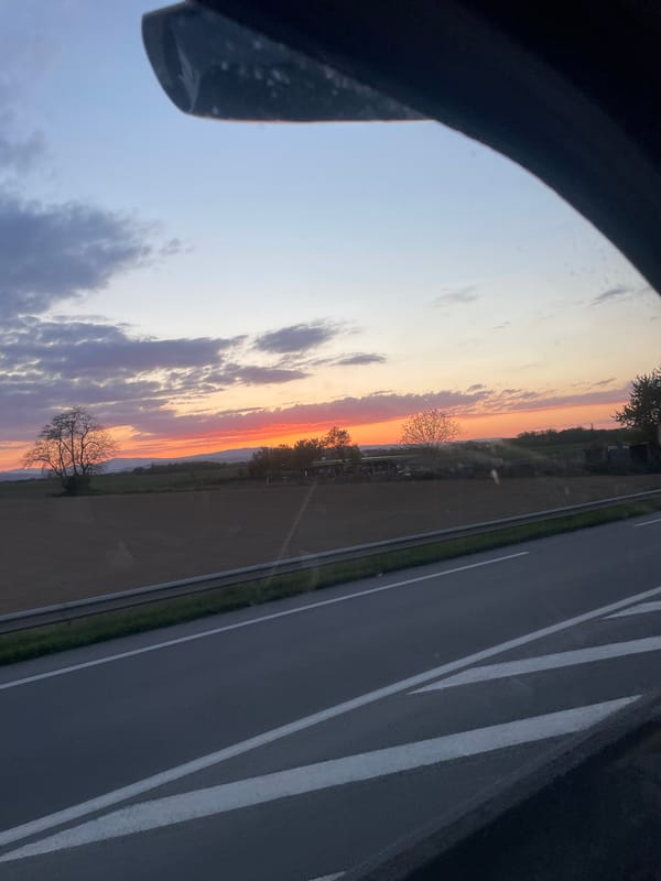 Sunset viewed from car window in Geispolsheim, France