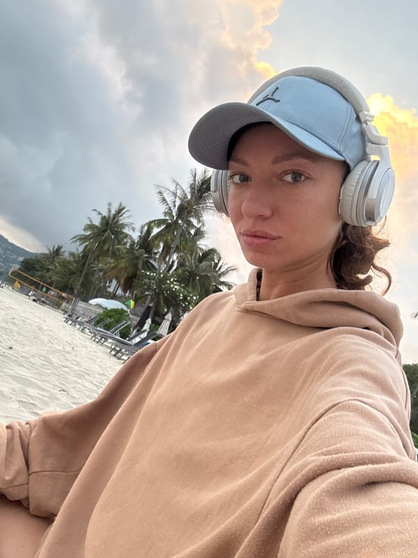 Woman enjoys beach time at Chaweng during dusk