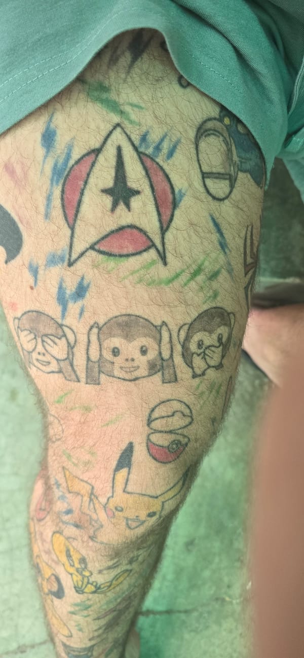Person documents cartoon tattoo collection in Bulgarian village