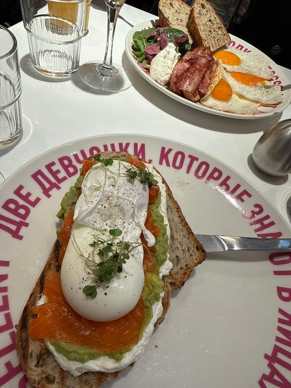 Woman enjoys champagne breakfast at Moscow restaurant