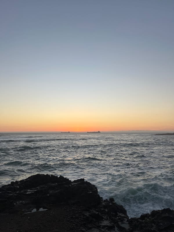 Sunset observed over ocean coastline in Arica, Chile