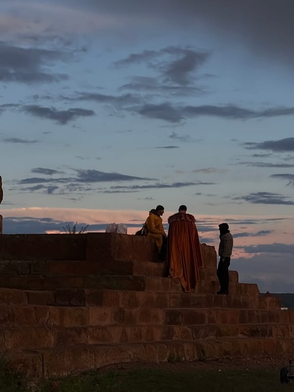 Teal-haired visitor explores historic ruins and landscapes in Anipemza