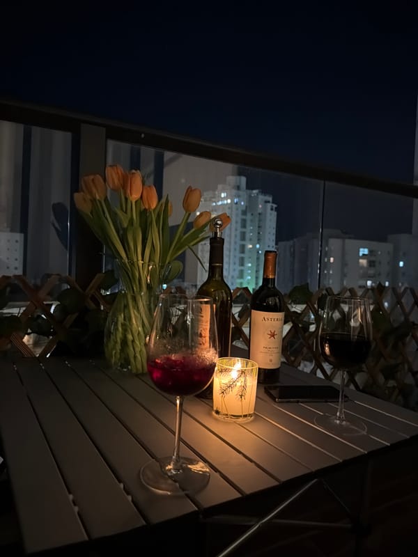 Romantic dinner setup captured against Bat Yam cityscape