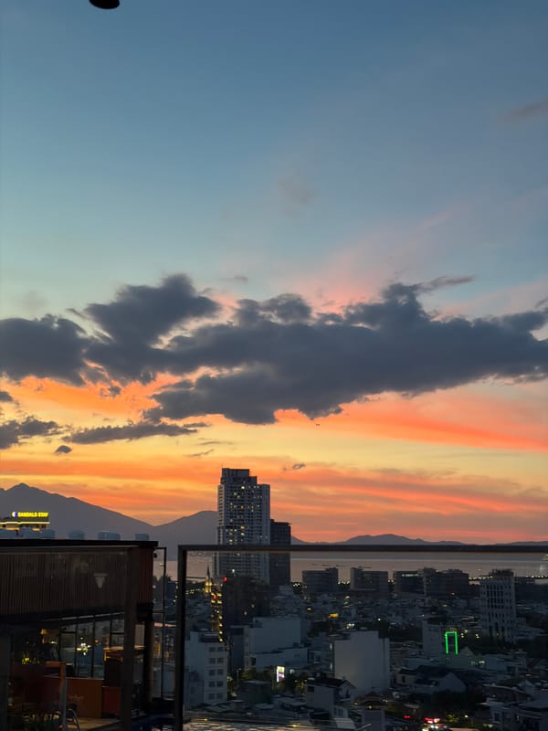 Rooftop sunset views across Đà Nẵng's skyline and venues