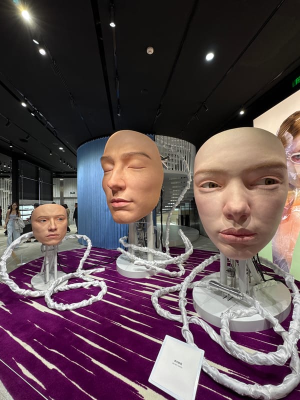 Realistic robot heads displayed in Chengdu art installation