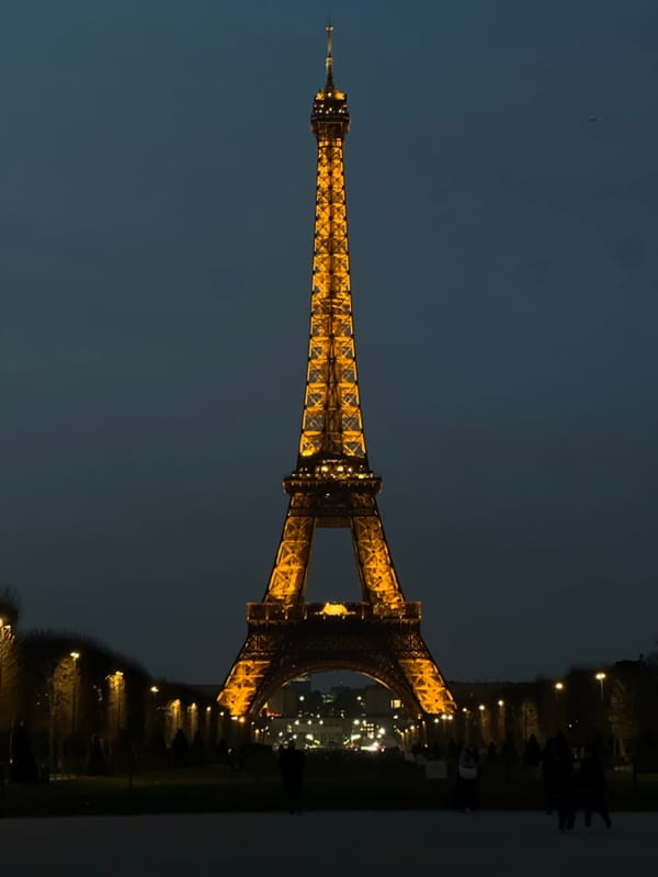 Evening scenes captured across Paris including Eiffel Tower views