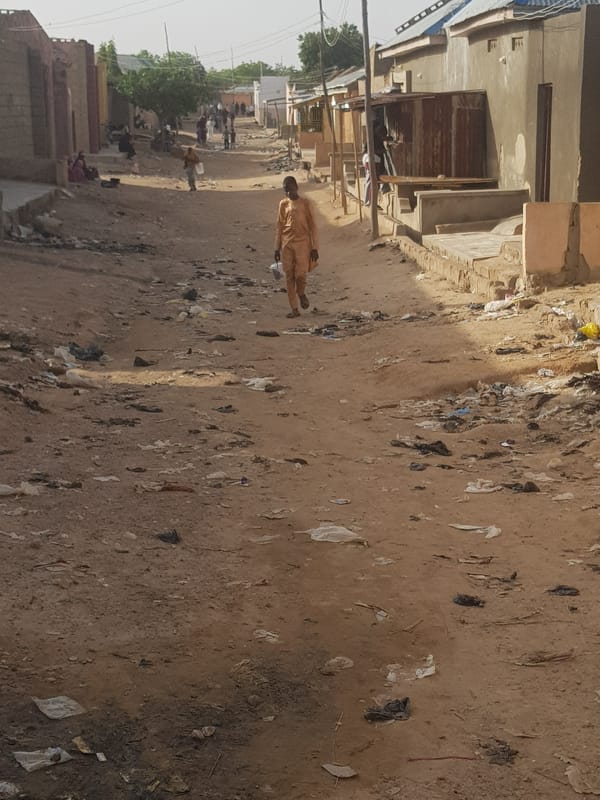 Daily street life documented across Dabawa, Nigeria roads