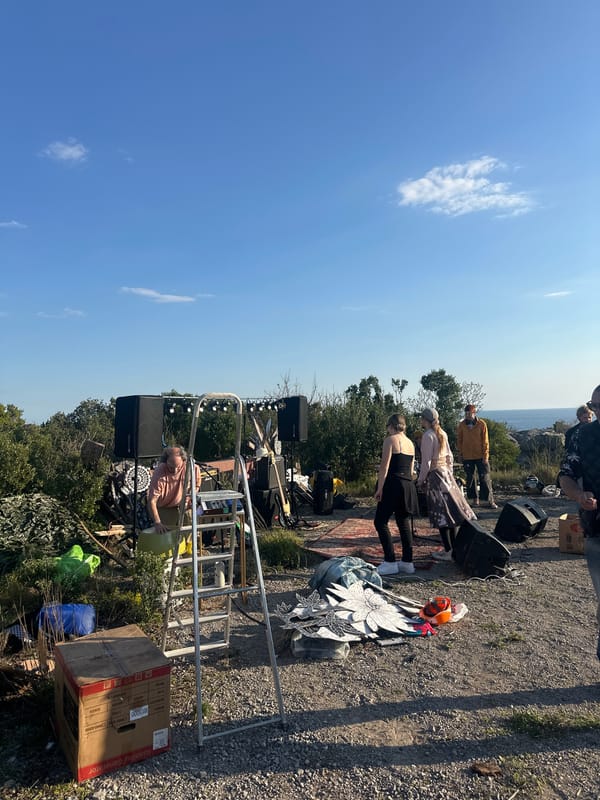 Outdoor gathering with fires, scattered objects documented across Montenegro villages