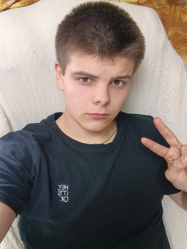 Person in text t-shirt observed in Красный Маяк, Russia