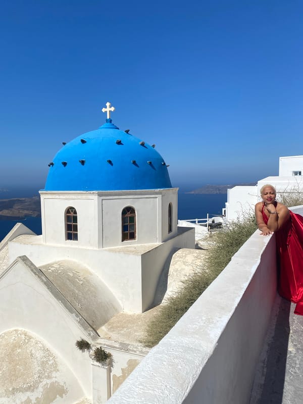 Morning at a blue-domed church in Santorini