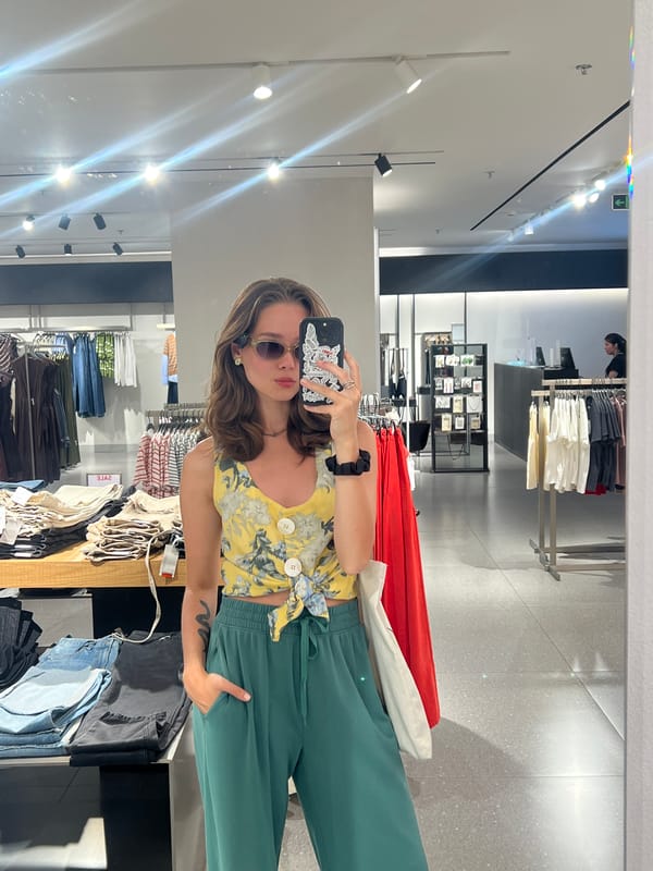 Shopper takes mirror selfie at Nha Trang clothing store