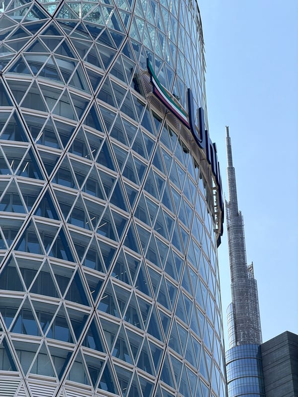 Exploring Porta Nuova's modern skyline on a sunny Milan afternoon