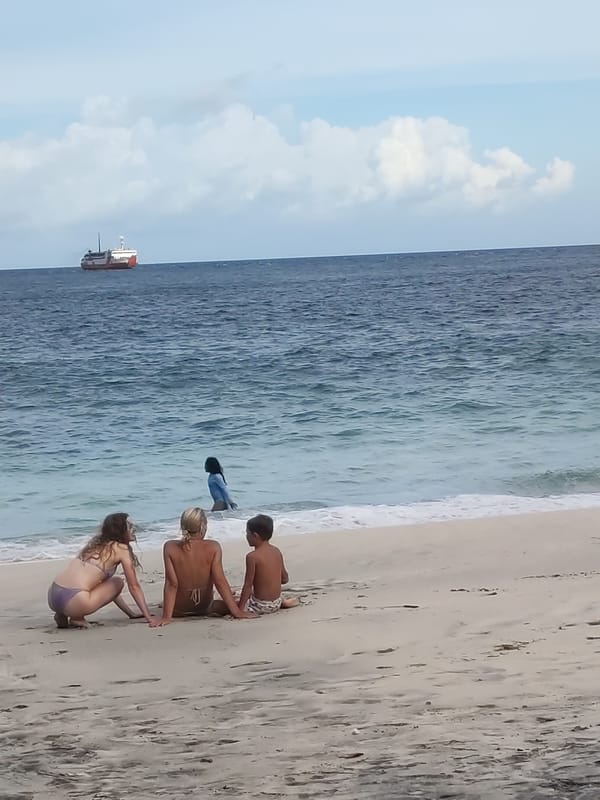 Families enjoy morning moments in Padangbai beach town