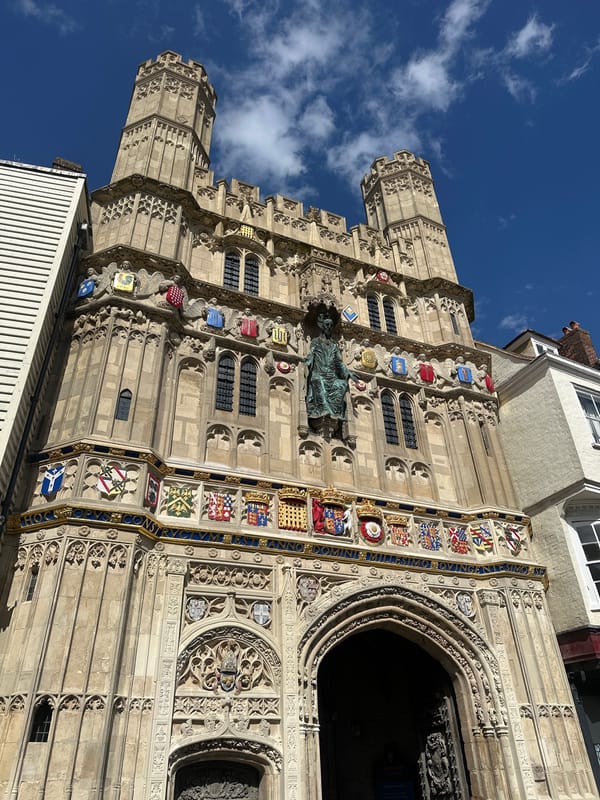 Canterbury visitor documents cathedral gate and colorful street scenes