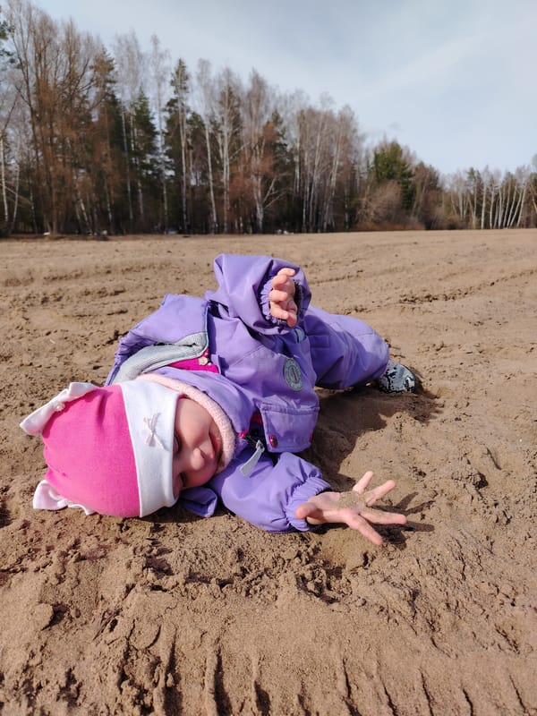 Family Beach Outing Documented in Northern Russia Spring Morning