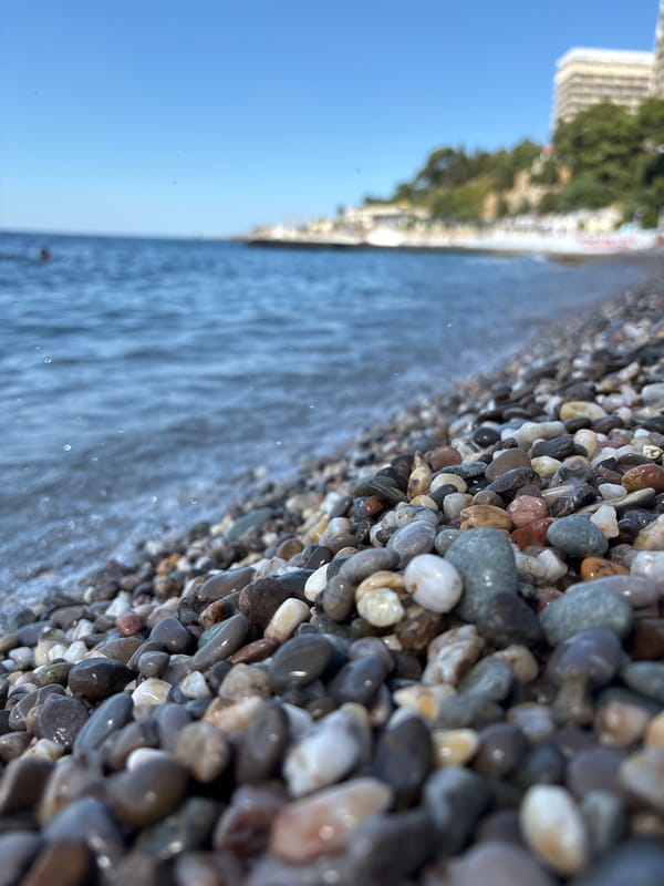 Quiet pebble beach on the Crimean coast, July morning