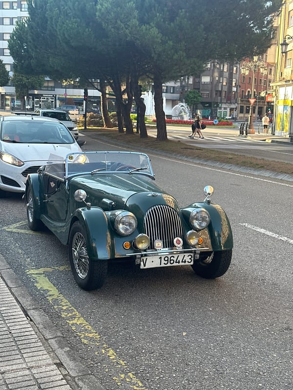 Vintage green Morgan Plus 4 parked on an Oviedo street