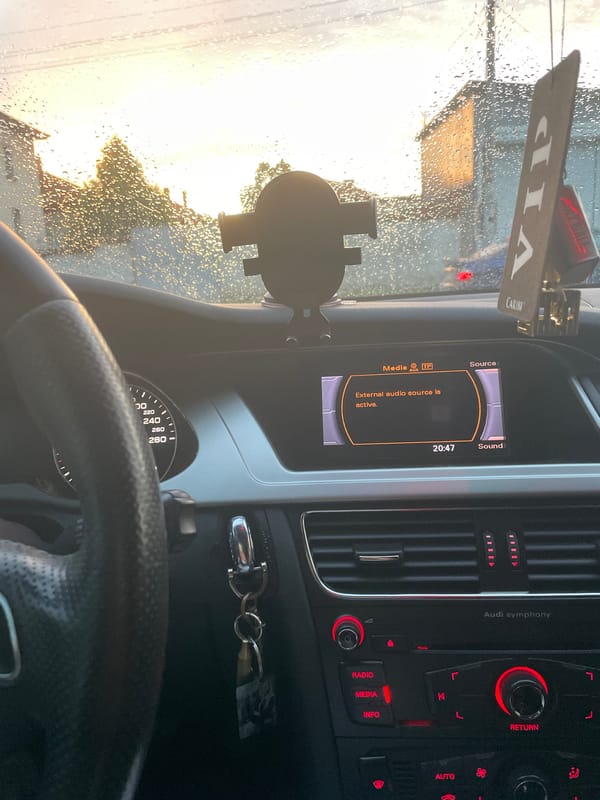 Driver documents rainy evening commute in Audi, Ihtiman Bulgaria
