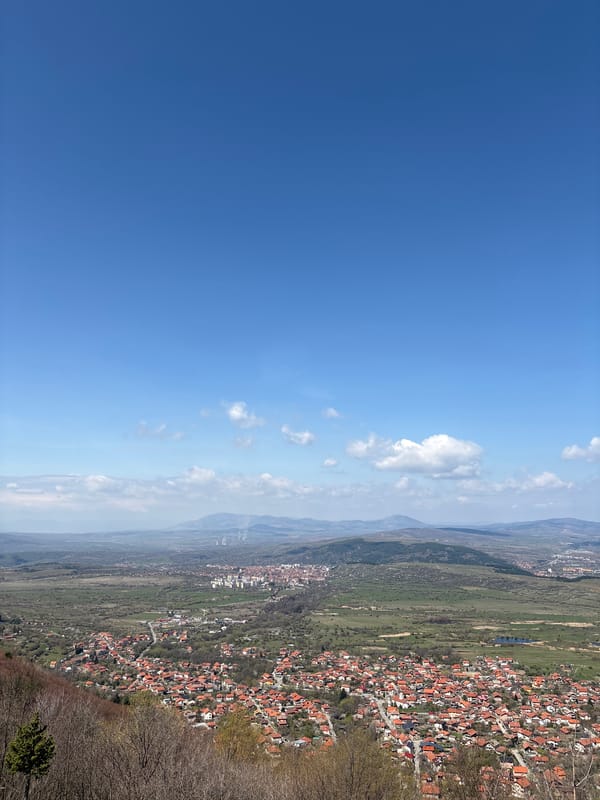 Clear morning view captured of red-roofed Bistritsa, Bulgaria
