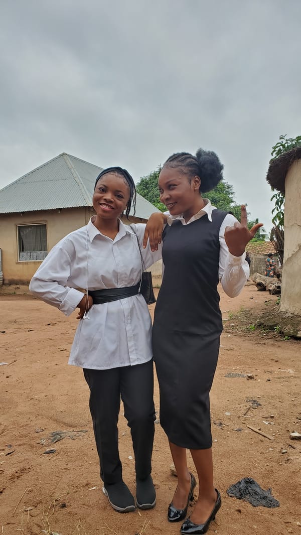 Friends posing outdoors in Jalingo, Nigeria