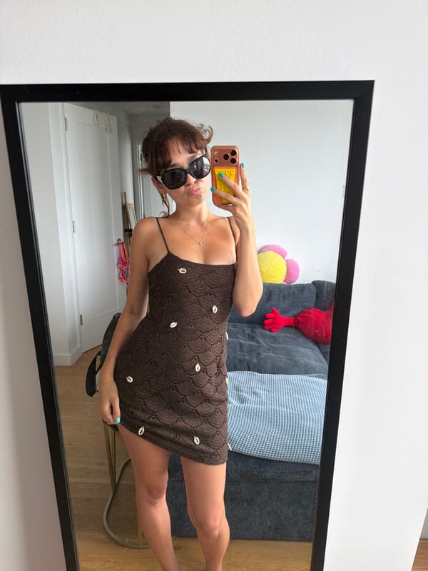 Crochet shell dress and mirror selfie in a NYC apartment