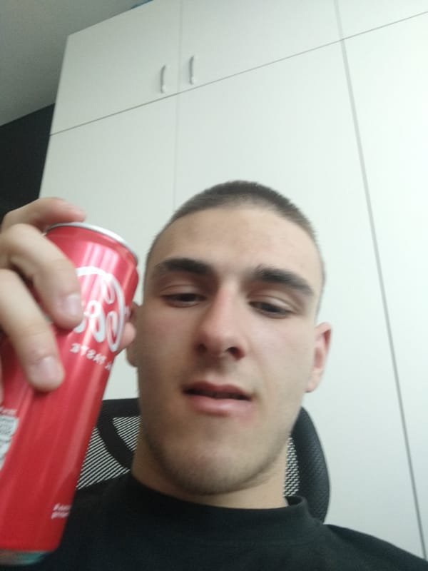 Man with Coca-Cola observed in Sofia office setting