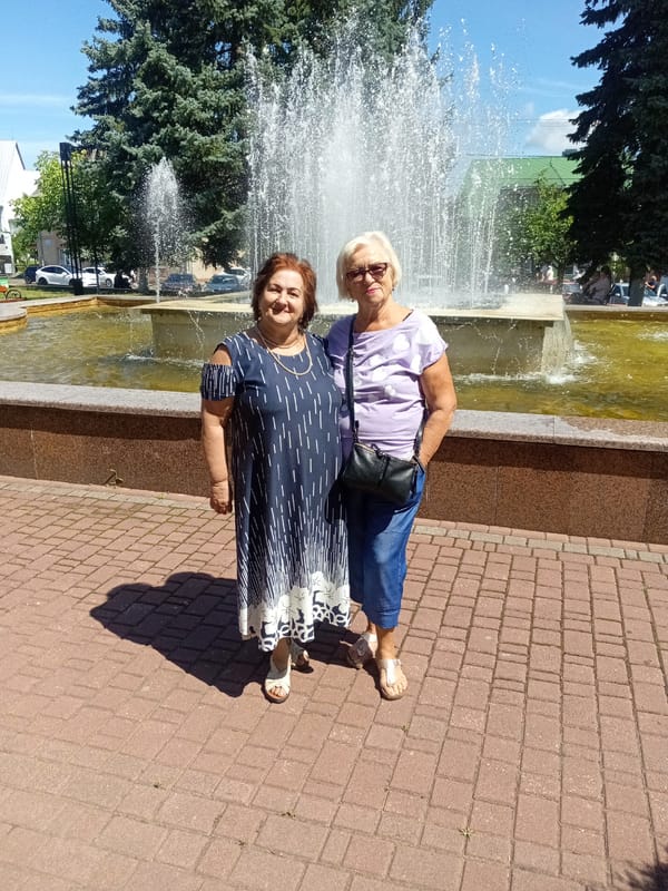 Tiachiv's central square buzzing on a bright summer morning