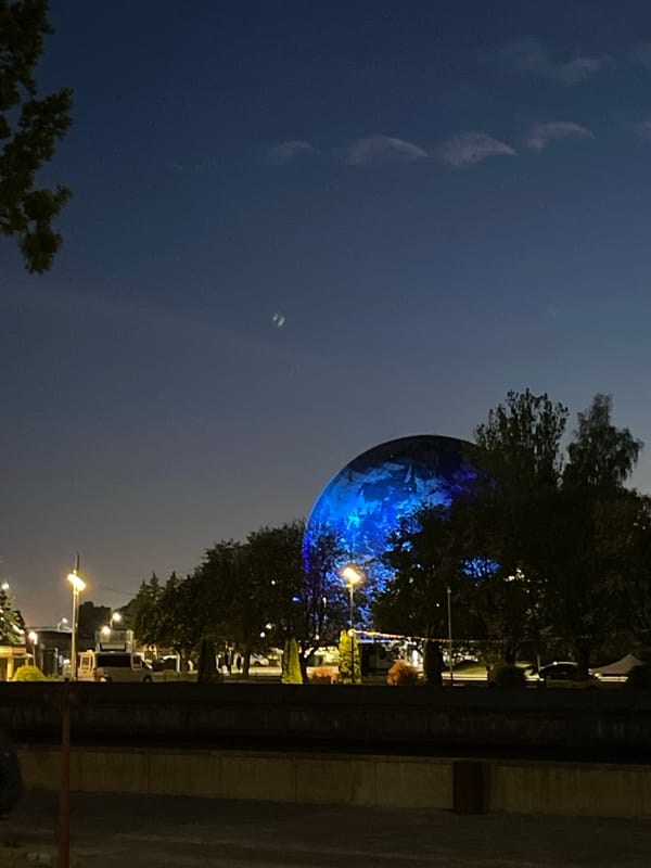 Evening lights illuminate Kaliningrad landmarks and waterfront architecture
