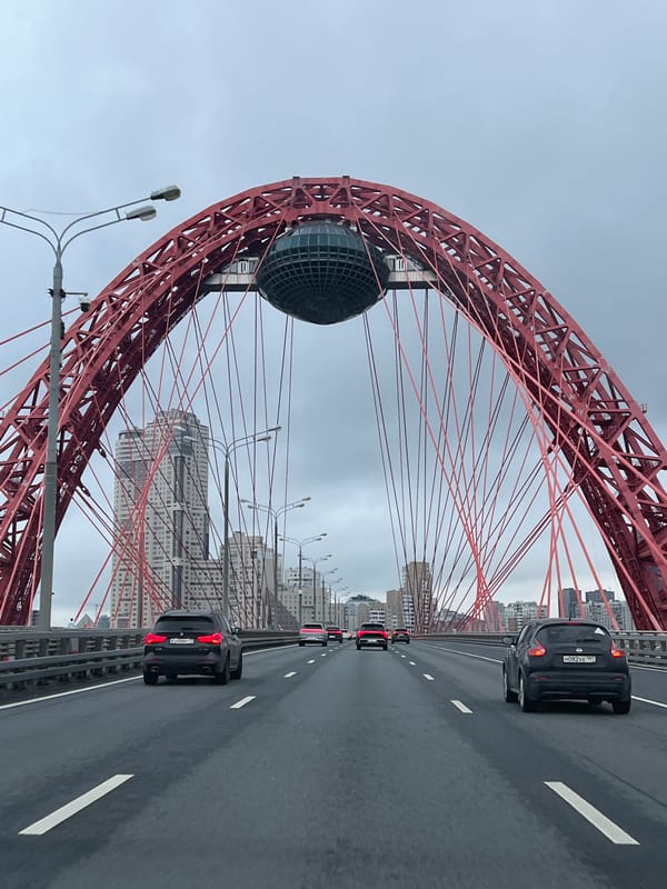 Crossing Khimki's iconic red-arched Zhivopisny Bridge by car