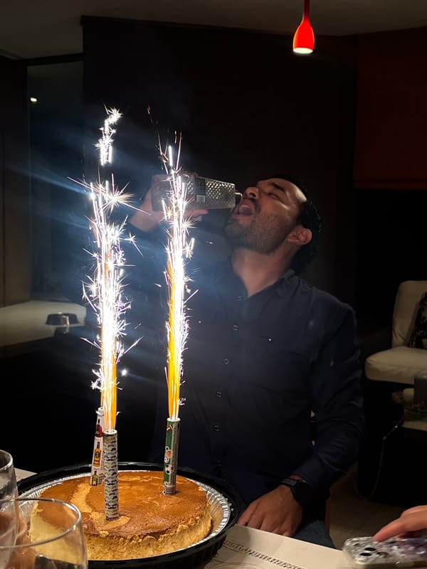 Man celebrates with sparkler cake in Puebla, Mexico