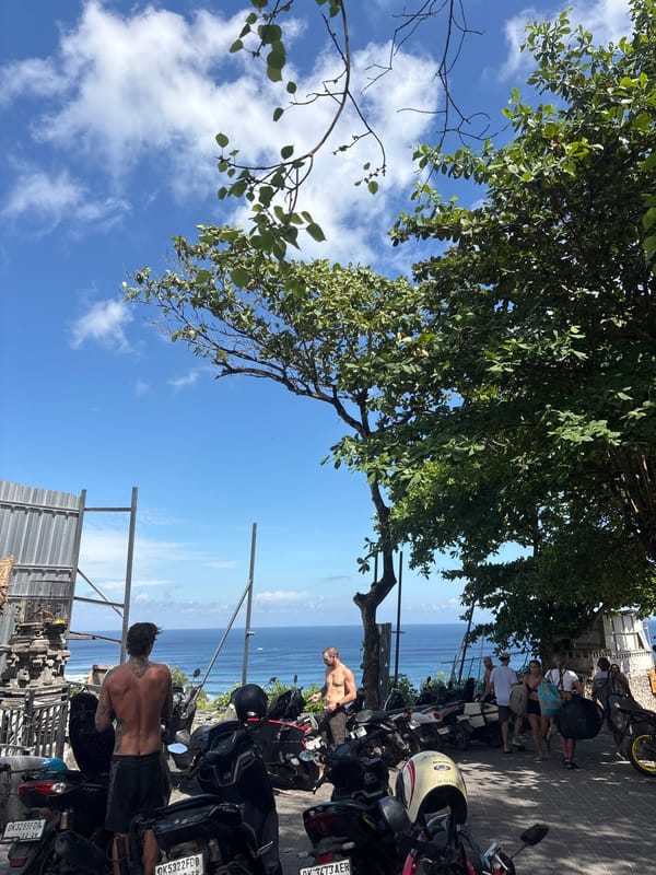 Early morning surf shop activity documented in Kuta Selatan